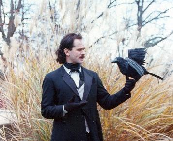 Smiling young woman with blonde hair in front of a textured wall.