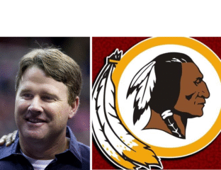 A man smiling next to the old Washington Redskins logo.