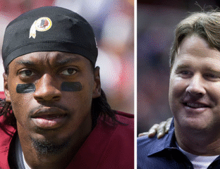 Close-up of two NFL players, one wearing a Washington Redskins cap.