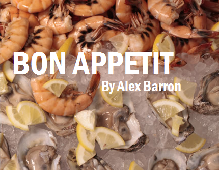 A close-up of shrimp on ice with lemon wedges, titled 'Bon Appetit' by Alex Barron.