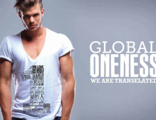 Young man in stylish white t-shirt with graphic print posing against a light background.