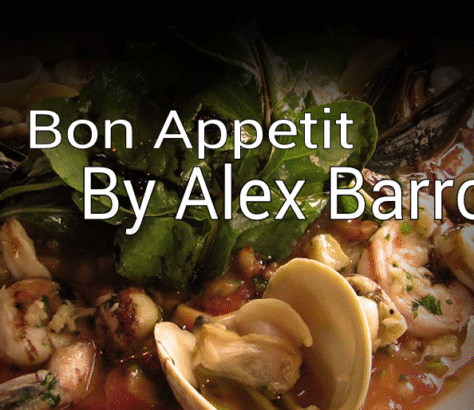 A delicious seafood dish garnished with fresh herbs and clams.