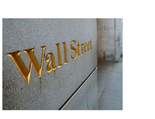 Wall Street sign engraved in gold on a stone wall.