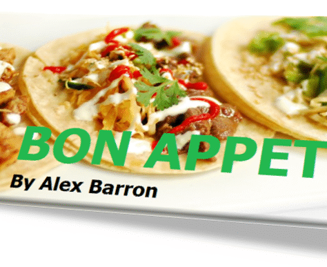 Delicious tacos garnished with fresh cilantro on a white plate.