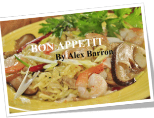 A delicious seafood pasta dish garnished with shrimp and mushrooms.