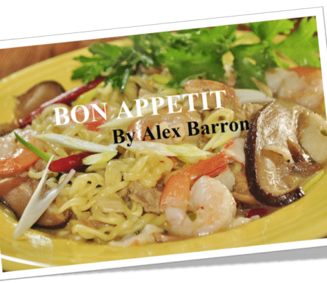 A delicious seafood pasta dish garnished with shrimp and mushrooms.