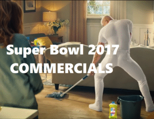 A humorous scene from a 2017 Super Bowl commercial featuring a man with a cat costume.