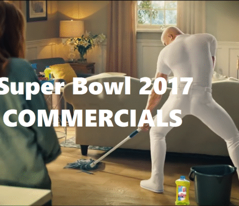 A humorous scene from a 2017 Super Bowl commercial featuring a man with a cat costume.