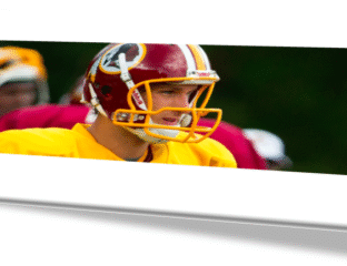 Football player in a red and yellow uniform with a helmet.