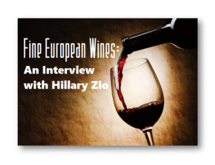 Pouring red wine into a glass for a European wine interview.