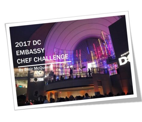Stage setup for the 2017 DC Embassy Chef Challenge event at night.