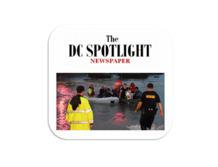 Rescue workers assist flooded area residents during a storm.