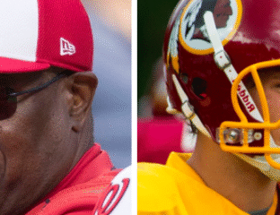 Close-up of two NFL players from rival teams, focused and intense.