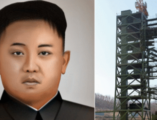 Portrait of a man next to a tall, industrial rocket launch structure.
