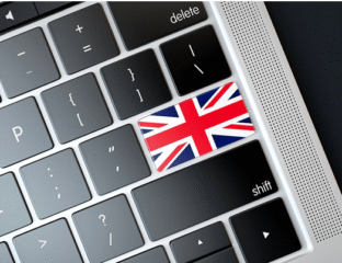Keyboard with a Union Jack flag on the Enter key.