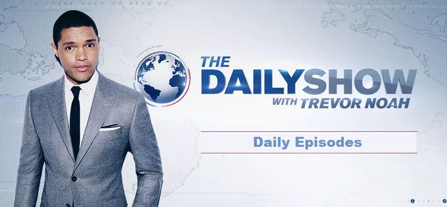 Host standing next to The Daily Show logo on a news set.