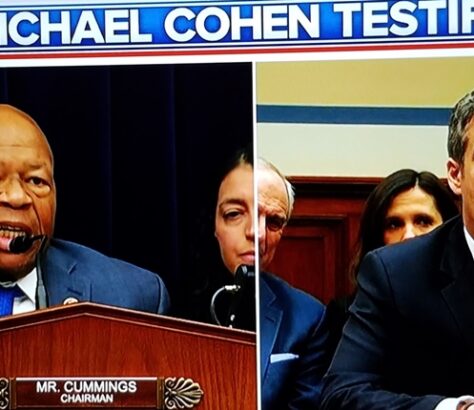 Two politicians testify during a congressional hearing.