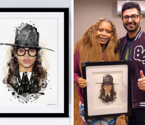 Two people holding a framed artistic portrait of a woman with glasses and a hat.