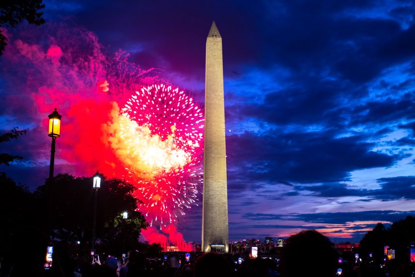Fireworks light up the night sky near the Washington Monument.