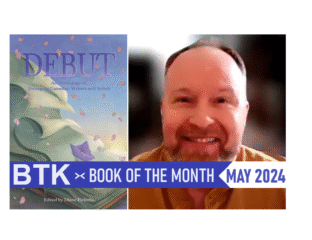 A smiling man discusses the May 2023 Book of the Month.