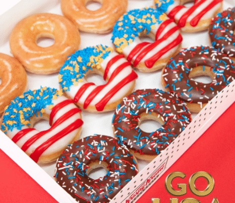 Colorful donut box with patriotic red, white, and blue decorations.