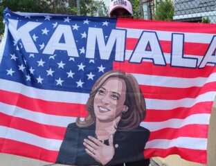 A Kamala Harris flag with an American flag background.